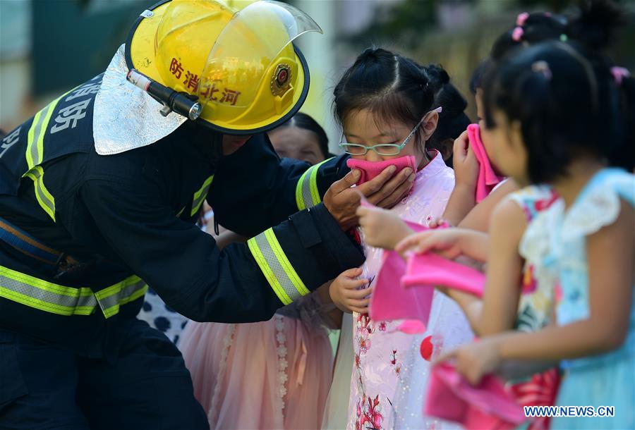 Children Participate in Fire Dr
